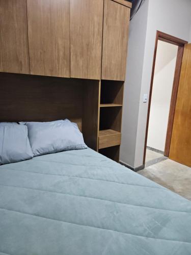 Ένα ή περισσότερα κρεβάτια σε δωμάτιο στο Refúgio do ipê