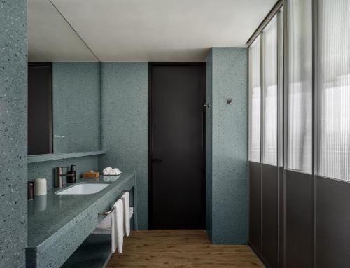 a bathroom with a sink and a mirror at NOA HOTEL BEIJING LONGFU-The Forbidden City in Beijing