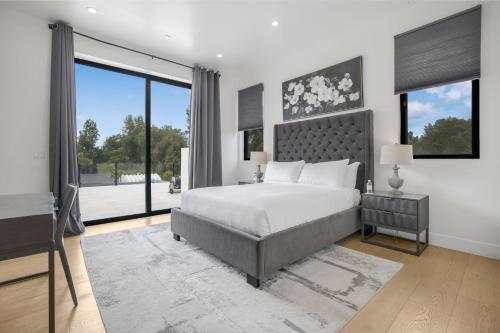 Ένα ή περισσότερα κρεβάτια σε δωμάτιο στο Villa Califa