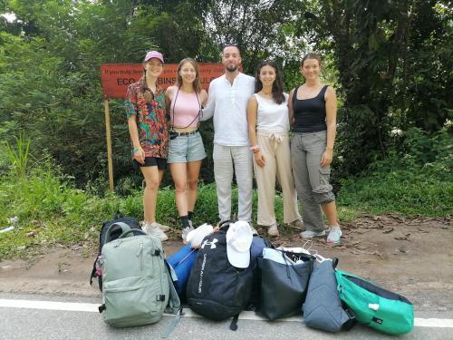 a group of people standing next to their bags at Eco Cabins Kitulgala in Kitulgala