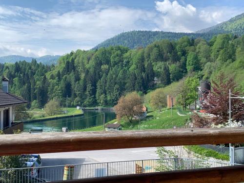 a view of a river from a balcony at Relais Tesino in Castello Tesino