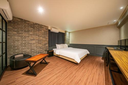 Postel nebo postele na pokoji v ubytování Hotel Lin