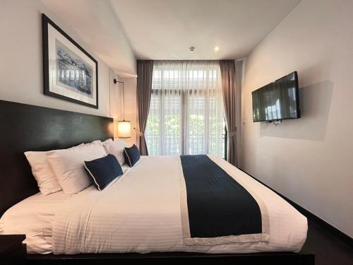 Katil atau katil-katil dalam bilik di Cheeva Dee Hotel