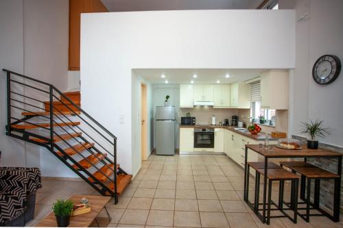 Kuchyň nebo kuchyňský kout v ubytování Unique Apartment