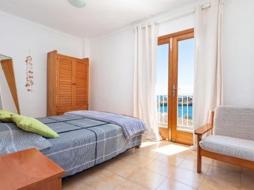 Ένα ή περισσότερα κρεβάτια σε δωμάτιο στο Vistas al Mar, cerca de la playa en Harmony