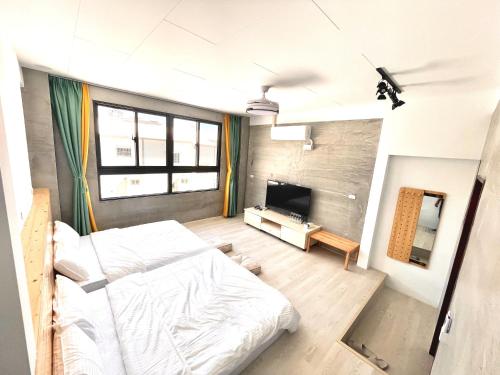 Una cama o camas en una habitación de Finding Popsicle Homestay