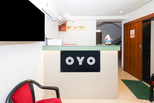 an office with an ovo sign on a wall at Hotel O Deluxe in Rānchī
