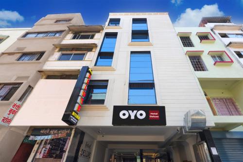 a building with an ovo sign in front of it at Hotel O Deluxe in Rānchī