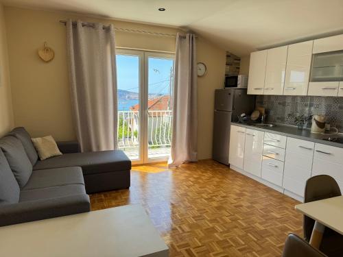 Kuchyň nebo kuchyňský kout v ubytování Apartment Serenada