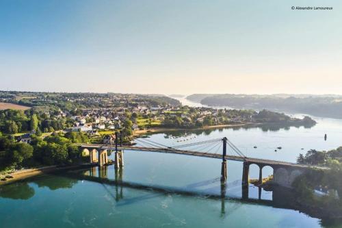 an aerial view of a bridge over a river at Penty des roitelets in Lézardrieux