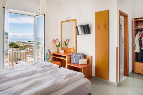 Hotel Tritoneにあるベッド