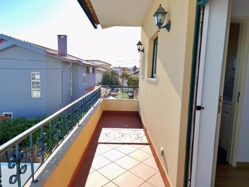 a view from the balcony of a house at Mbird Rosario Family House in Cascais
