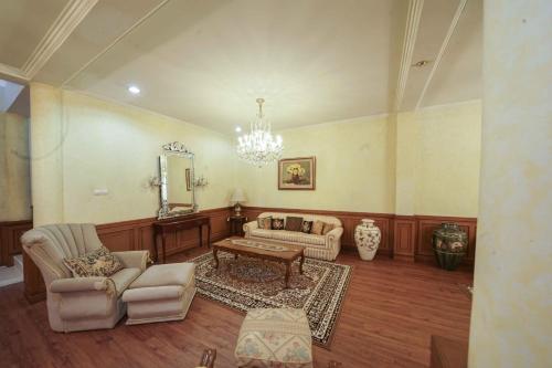 Χώρος καθιστικού στο Casa Setra Bandung