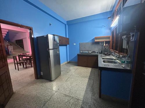 Kuchyň nebo kuchyňský kout v ubytování Sanam Homestay