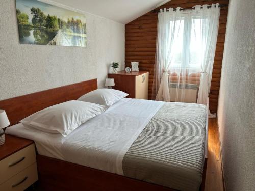 Postel nebo postele na pokoji v ubytování AnteAna Vrlika Split