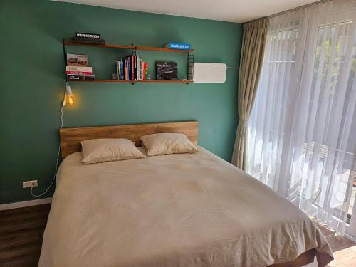Postel nebo postele na pokoji v ubytování Eco lodge Utrecht Leidsche Rijn