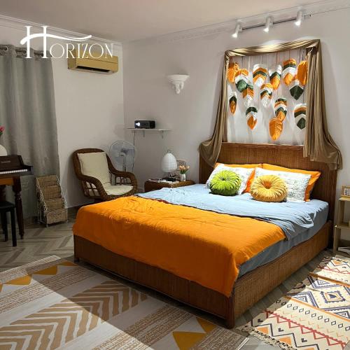 Ένα ή περισσότερα κρεβάτια σε δωμάτιο στο Horizon Home - Netflix&Chill