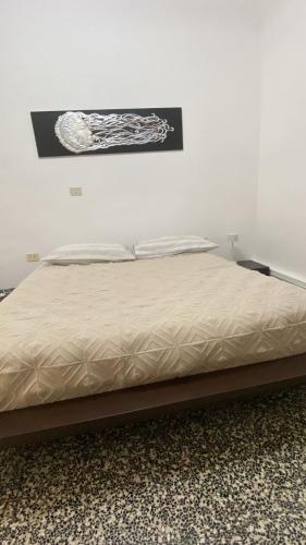 Postel nebo postele na pokoji v ubytování Apartment Caorso Rino
