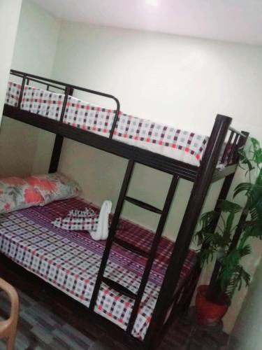 Postel nebo postele na pokoji v ubytování Avana Hills Tagaytay Villa