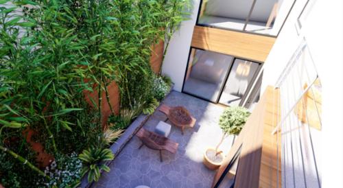 Piso con dos habitaciones con camas dobles y terrazas en el Poblenou