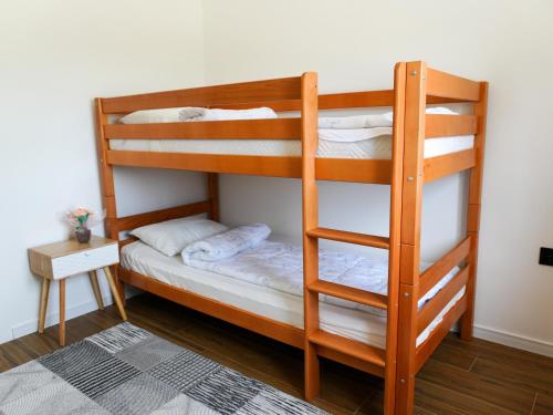 Postel nebo postele na pokoji v ubytování UNA Escape
