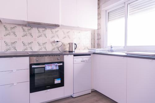 Køkken eller tekøkken på Avenida Principal muy cerca de la playa - By Aloha Palma