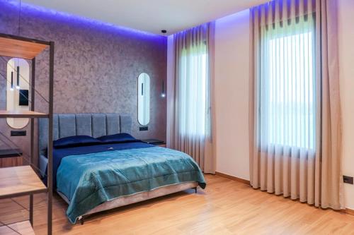 Ένα ή περισσότερα κρεβάτια σε δωμάτιο στο Mega Luxury Villa