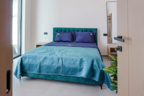 Ένα ή περισσότερα κρεβάτια σε δωμάτιο στο Mega Luxury Villa