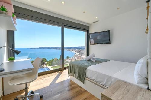 Giường trong phòng chung tại Villa Bali by Marhen Homes