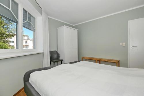 Postel nebo postele na pokoji v ubytování Hermannstraße 16a Wohnung Seestern