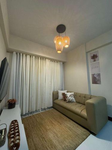Zona de estar de Mactan Newtown Condo with Pool access
