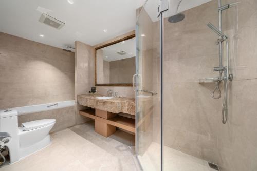 Ein Badezimmer in der Unterkunft 西安荣民国际饭店
