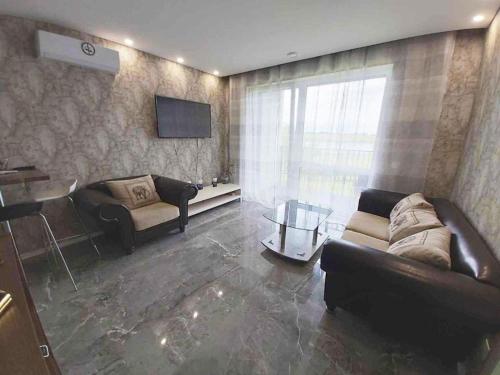 Χώρος καθιστικού στο Apartamentai prie ežero