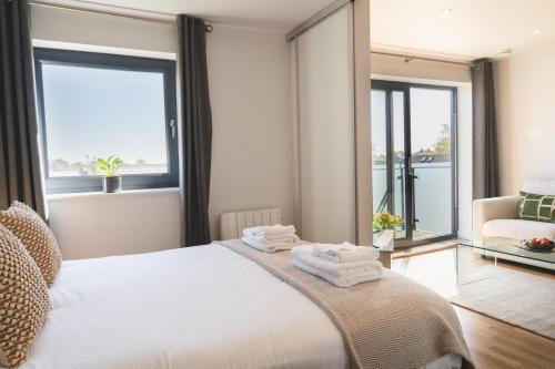 Ένα ή περισσότερα κρεβάτια σε δωμάτιο στο Your Space Apartments - Eden House