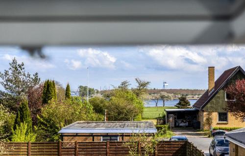 a view of a house with a roof at 3 Bedroom Awesome Home In Otterup in Otterup