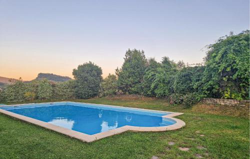 a swimming pool in the yard of a house at Stunning Home In Camporosso in Camporosso