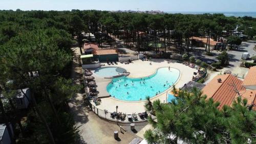 Bazén v ubytování Camping 3 étoiles - Parc aquatique - ccaff0b nebo v jeho okolí