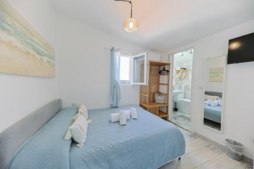 Letto o letti in una camera di Casanova Rooms and Apartment to Rent