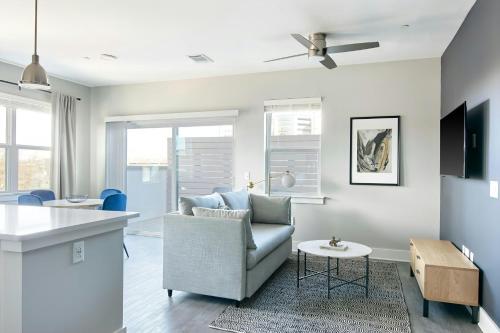 a living room with a couch and a table at Sonder by Marriott Bonvoy Belcourt Apartments Hillsboro Village in Nashville
