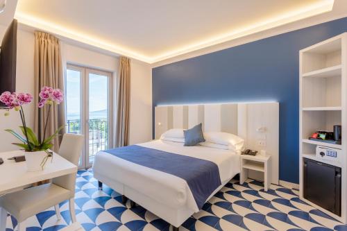 Hotel Central Wellnessにあるベッド