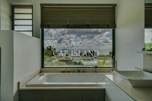 Φωτογραφία από το άλμπουμ του Villa vue mer avec accès privé plage σε Cap Malheureux