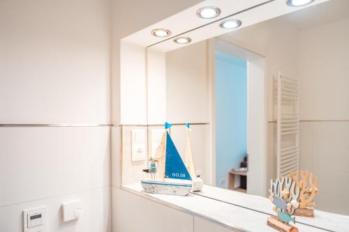 Et badeværelse på Apartment YoungFamily, Am Alten Deich 14 2