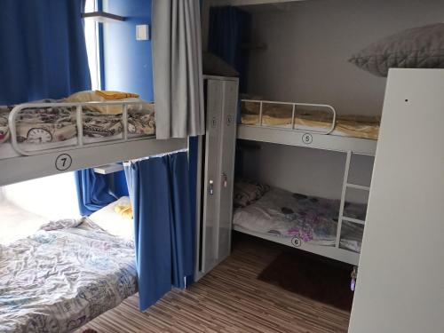 Postel nebo postele na pokoji v ubytování Hostel Renato
