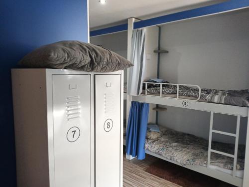 Postel nebo postele na pokoji v ubytování Hostel Renato