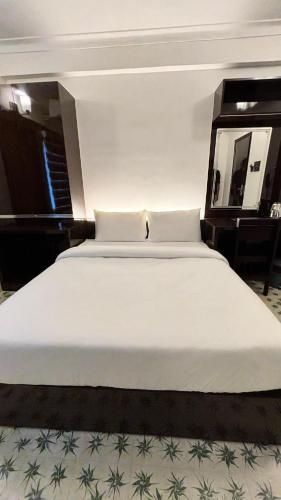 Luxe Style Hotelsにあるベッド