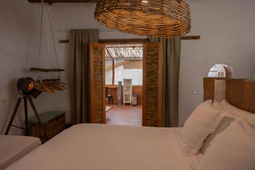 Ένα ή περισσότερα κρεβάτια σε δωμάτιο στο LOLO & Lo- Casa privada con vista, hamaca y ubicación ideal 2 hab y Starlink