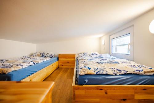 Postel nebo postele na pokoji v ubytování Tiny Haus Boddenblick