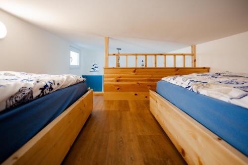 Katil atau katil-katil dalam bilik di Tiny Haus Boddenblick