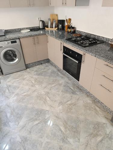 Una cocina o cocineta en Appartement Golden Beach-Dahomey