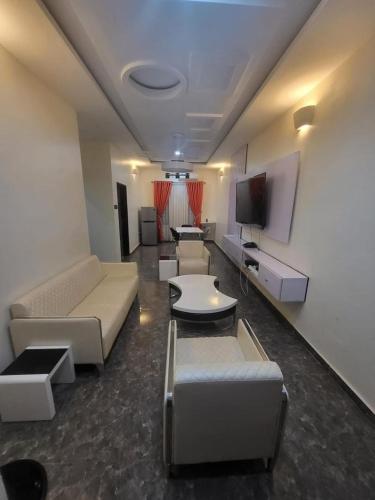 TV a/nebo společenská místnost v ubytování El PADRINO APARTMENTS